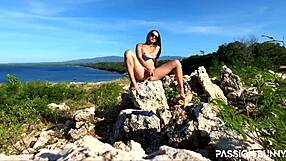 Watch this perfect model masturbate her shaved pussy with a toy on a public mountain - not scared of getting caught!