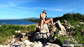 Watch this perfect model masturbate her shaved pussy with a toy on a public mountain - not scared of getting caught!