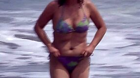 curvy mature wife on public beach flashes huge tits hairy pussy and fingers for cuckold voyeurs