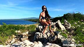 Watch this perfect model masturbate her shaved pussy with a toy on a public mountain - not scared of getting caught!