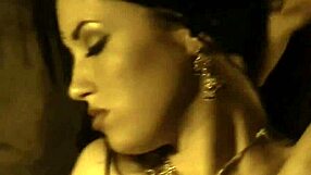 Exotic Asian Babe Strips Naked by Sensual Fire Teasing Curves