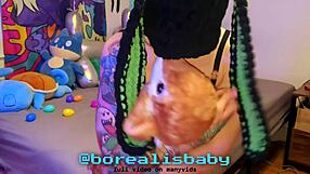 tattooed girl bathes easter bunny plushie wet in bed