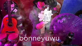 bonneyuwu sucks dildo in miniskirt on bed