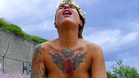 wanna watch this short-haired tattooed milf ride cock on the beach?