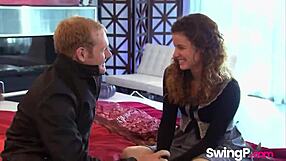 check out this classy brunette milf fingering her shaved pussy in retro swing orgy