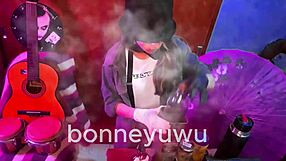 bonneyuwu sucks dildo in miniskirt on bed