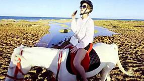 wanna see this cute white african blonde riding outdoors on beach with natural tits?