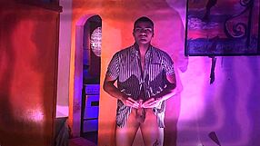 muscular bodybuilder strokes massive cock in purple style slowly