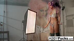 A Musical Tease of a Photo Shoot with Abigail Mac's Big Tits and Pussy