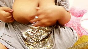 big titted indian aunty teases her huge boobs for you?