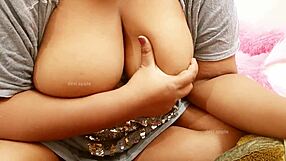 big titted indian aunty teases her huge boobs for you?