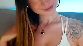 tattooed babe loses control fingering herself wildly on webcam like a total slut