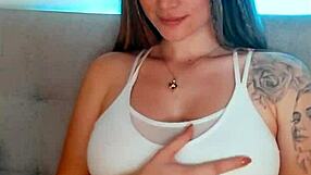 tattooed babe loses control fingering herself wildly on webcam like a total slut