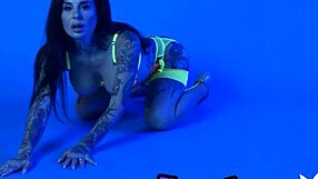 wanna watch this busty milf Joanna Angel strip her neon lingerie slow?