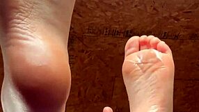 Girl Smoothly Applies Lotion to Her Soft Feet in Close-Up