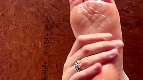 Girl Smoothly Applies Lotion to Her Soft Feet in Close-Up