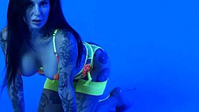 wanna watch this busty milf Joanna Angel strip her neon lingerie slow?