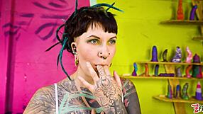 tattooed goth teen shoves z-filmz toys deep in pussy and gaping asshole