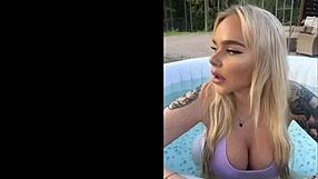gringa with big tits lounging by the pool in sexy lingerie