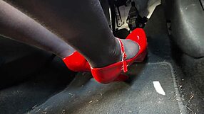 Redhead in heels and leggings pumps pedals to office secretly