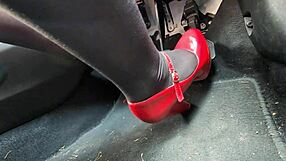 Redhead in heels and leggings pumps pedals to office secretly