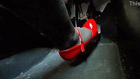 Redhead in heels and leggings pumps pedals to office secretly