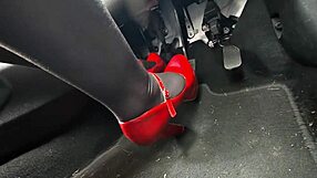 Redhead in heels and leggings pumps pedals to office secretly