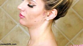 Drop dead gorgeous blonde strips and showers seductively in steamy casting