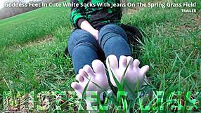i adore goddess feet in cute white socks jeans on spring grass