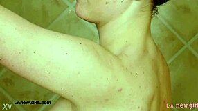 Drop dead gorgeous blonde strips and showers seductively in steamy casting