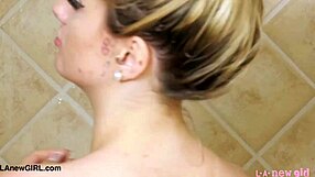 Drop dead gorgeous blonde strips and showers seductively in steamy casting