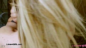 Drop dead gorgeous blonde strips and showers seductively in steamy casting