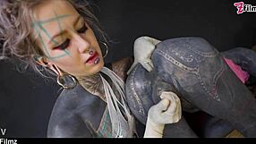 Tattooed dominatrix fists tranny ass gaping tight hole