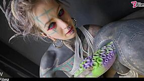Tattooed dominatrix fists tranny ass gaping tight hole
