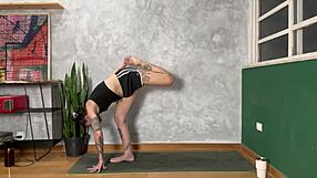 hey check out this hot tattooed girl doing yoga at home, damn she's flexible...