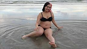 Pregnant teen beauty seduces beach crowd in unexpected tease