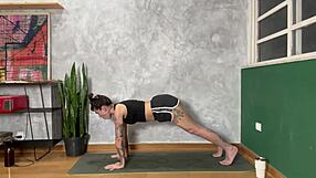 hey check out this hot tattooed girl doing yoga at home, damn she's flexible...