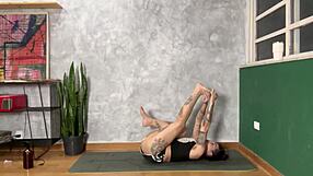 hey check out this hot tattooed girl doing yoga at home, damn she's flexible...