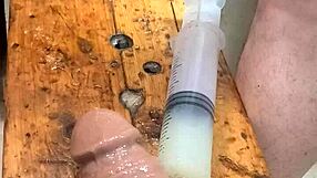 oiled ass stuffed with lube then machine fucked huge dildo solo