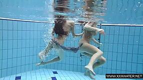 shaved big tits brunette teases tight pussy underwater