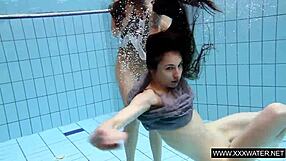shaved big tits brunette teases tight pussy underwater