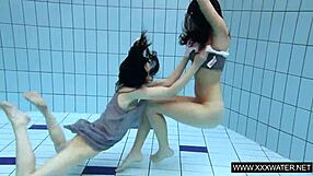 shaved big tits brunette teases tight pussy underwater