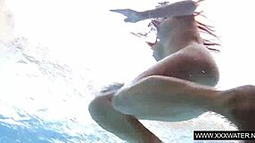 shaved big tits brunette teases tight pussy underwater
