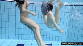 shaved big tits brunette teases tight pussy underwater
