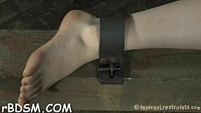 bound sexy slave endures rough toy bondage torment