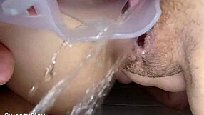 chubby milf pees in public shower with huge vaginal dilator