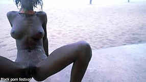 Skinny ebony village girl shakes naked in rain flaunting slim waist and tits