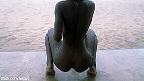 Skinny ebony village girl shakes naked in rain flaunting slim waist and tits
