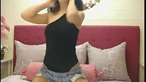webcam girl dances on pillow in tight unitard shaking her ass
