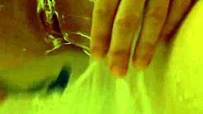 Redhead babe shaves smooth pussy in steamy shower